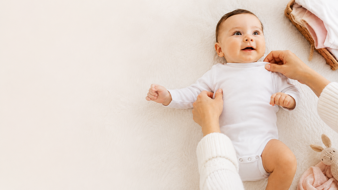 Cómo poner el body a un bebé
