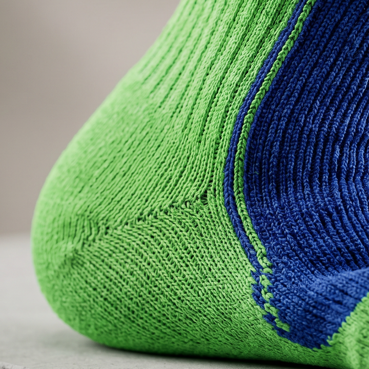 PRENEL - Medias Potenciadoras del Rendimiento con Energía Elástica - VERDE AZUL LOGO PRENEL