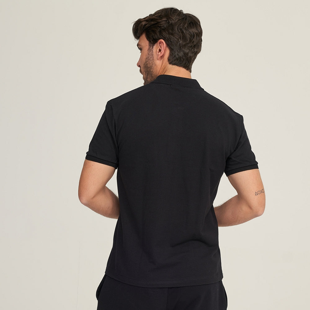 7290 POLO PIQUÉ CON PUÑO Y BOLSILLO. CORTE HOLGADO