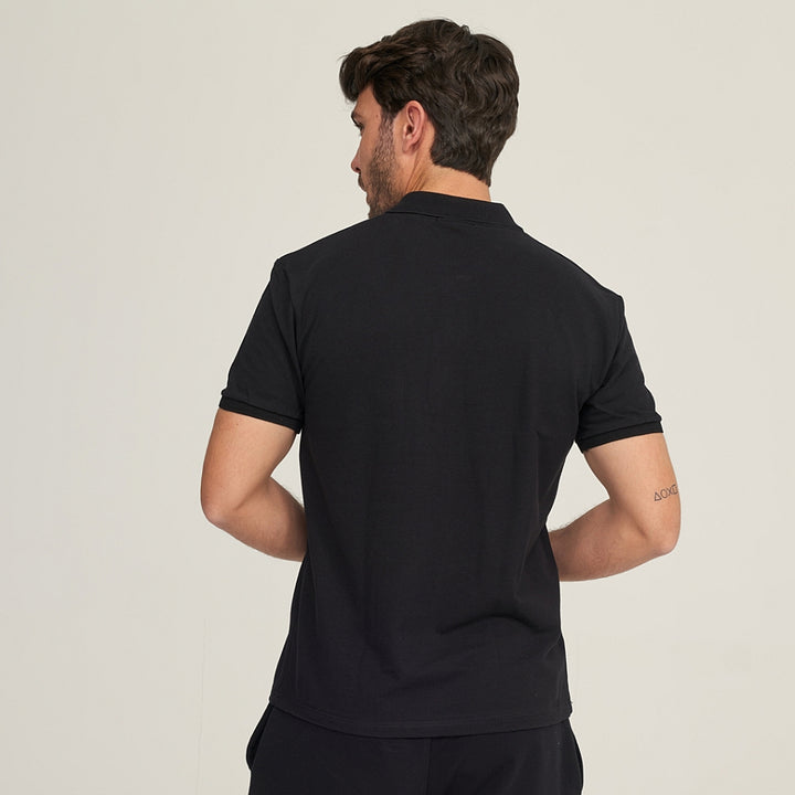 7290 POLO PIQUÉ CON PUÑO Y BOLSILLO. CORTE HOLGADO