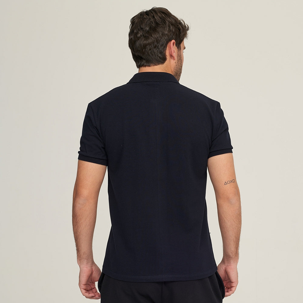 7290 POLO PIQUÉ CON PUÑO Y BOLSILLO. CORTE HOLGADO