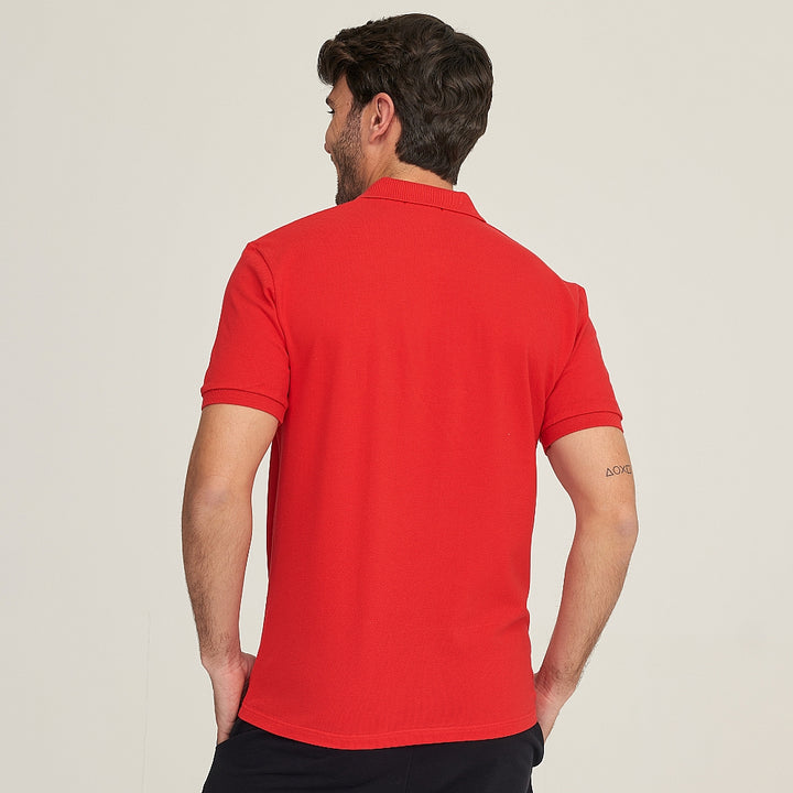 7290 POLO PIQUÉ CON PUÑO Y BOLSILLO. CORTE HOLGADO