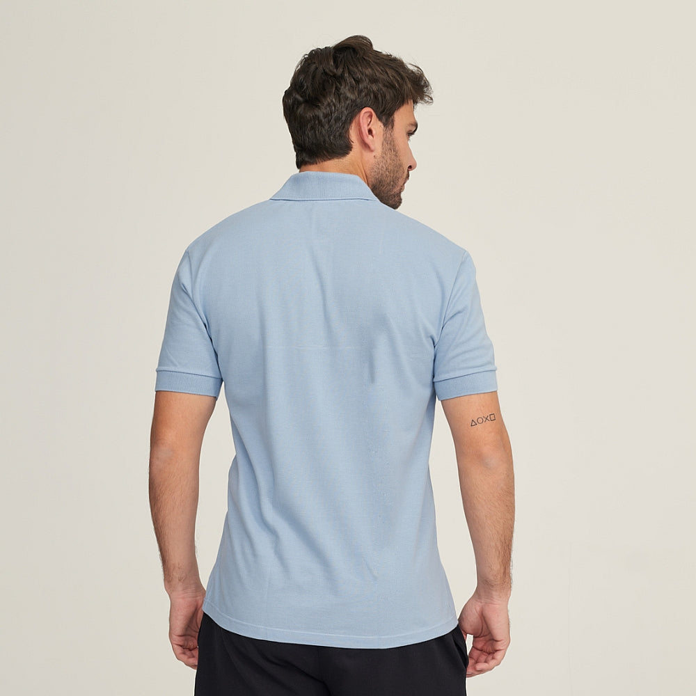 7290 POLO PIQUÉ CON PUÑO Y BOLSILLO. CORTE HOLGADO