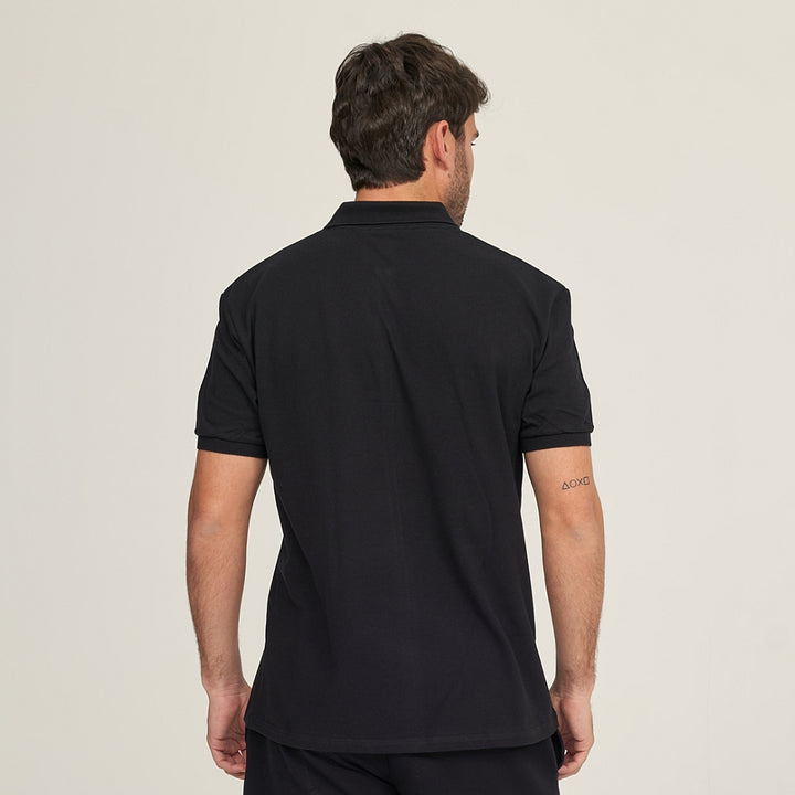 7291 POLO PIQUÉ CON PUÑO. CORTE HOLGADO