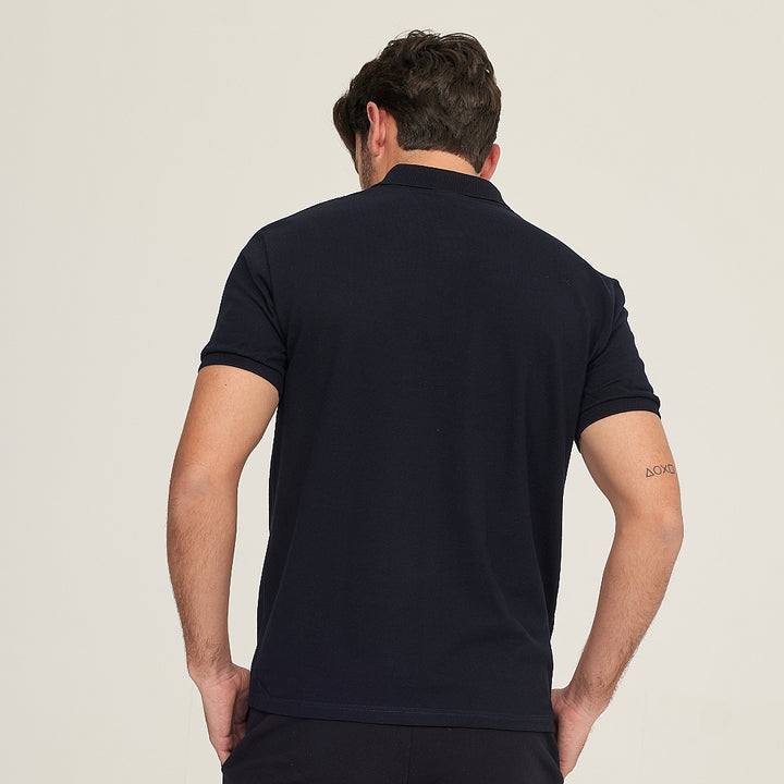 7291 POLO PIQUÉ CON PUÑO. CORTE HOLGADO