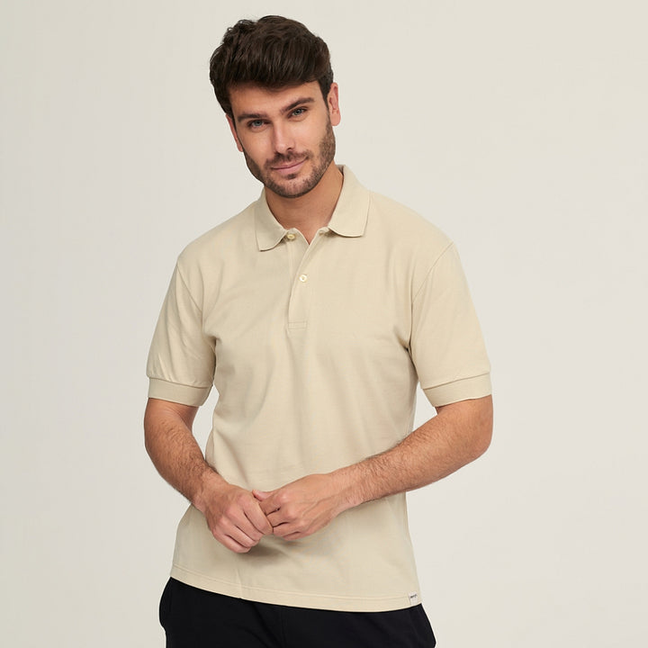 7291 POLO PIQUÉ CON PUÑO. CORTE HOLGADO 482-Crema