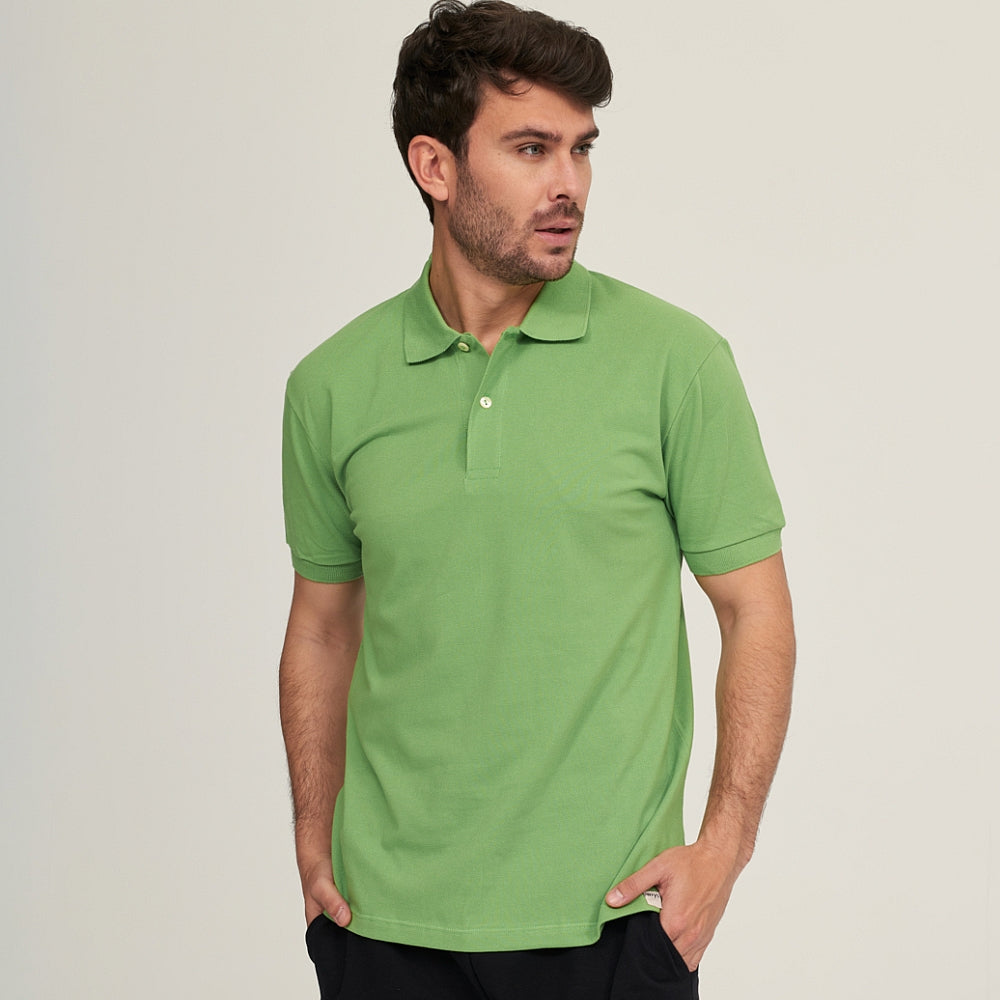 7291 POLO PIQUÉ CON PUÑO. CORTE HOLGADO 822-Verde
