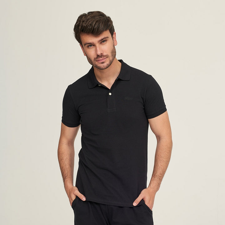 7589b POLO PIQUÉ CON PUÑO. CORTE AJUSTADO 009-Negro 2XL-64