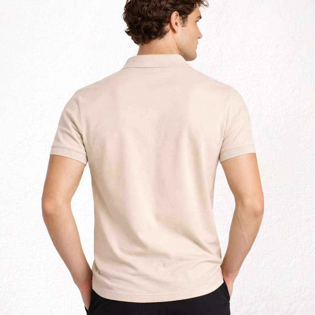 7290 POLO PIQUÉ CON PUÑO Y  BOLSILLO. CORTE HOLGADO