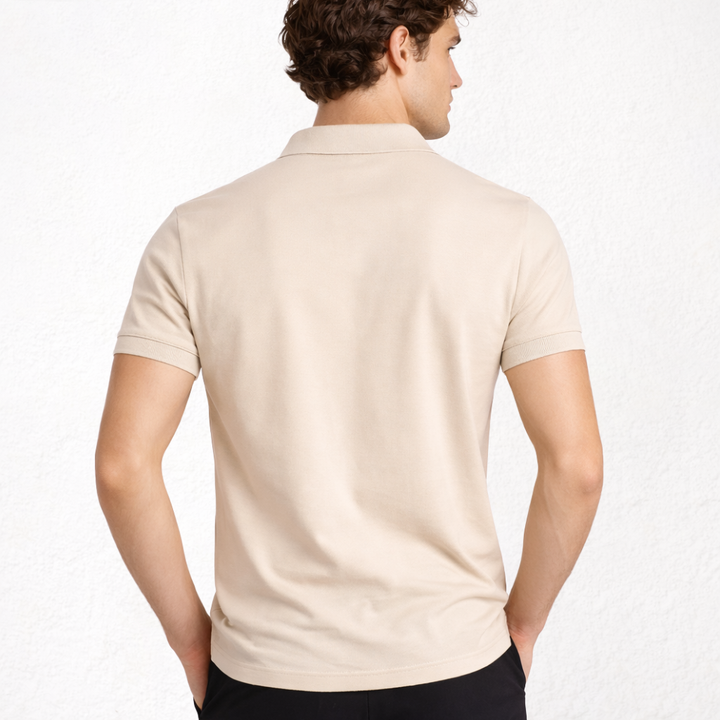 7290 POLO PIQUÉ CON PUÑO Y  BOLSILLO. CORTE HOLGADO