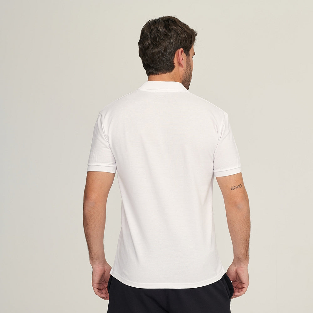 7290b POLO PIQUÉ CON PUÑO Y BOLSILLO. CORTE HOLGADO