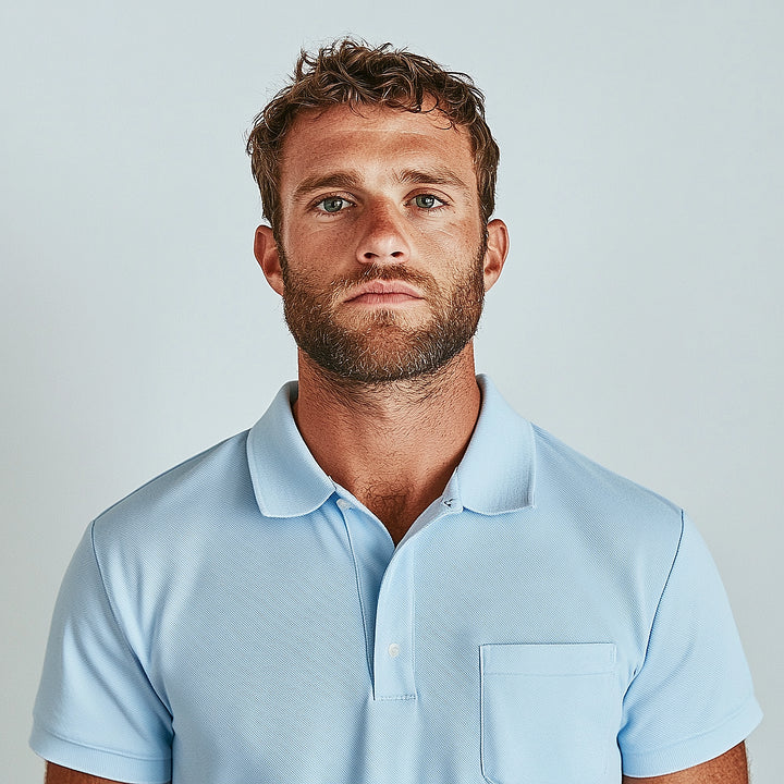 7290 POLO PIQUÉ CON PUÑO Y BOLSILLO. CORTE HOLGADO